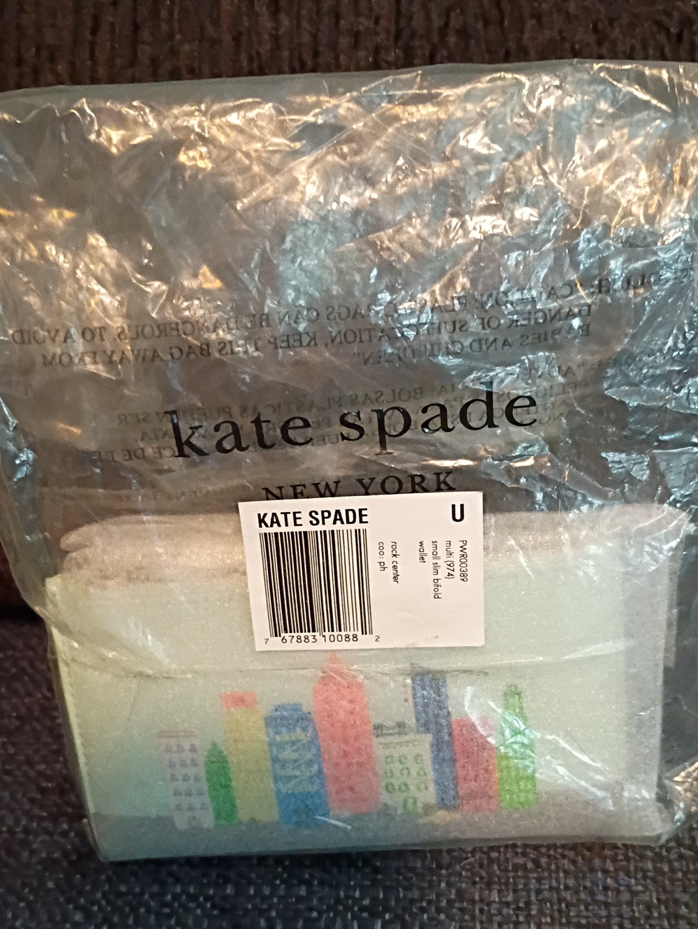kate spade pastel city skyline card wallet in mint, pink, blue